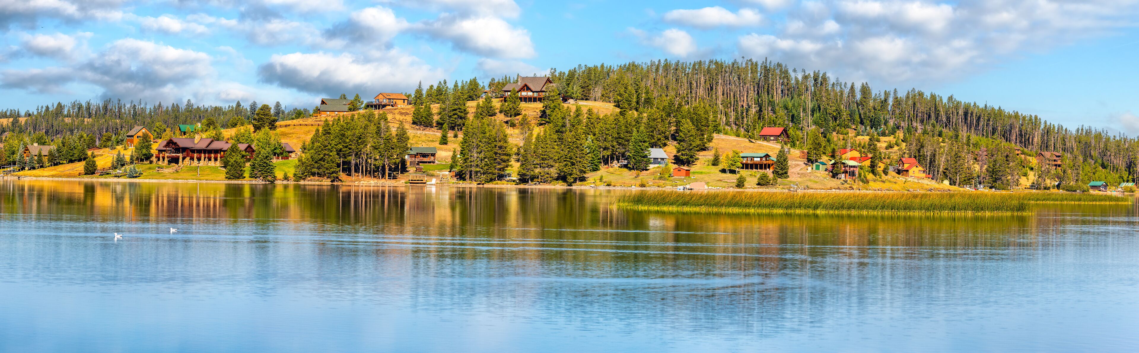 Georgetown lake panorama, near Anaconda, Montana. The Georgetown lake reservoir was created in 1885 to produce power for the town of Phillipsburg and area mining operations.