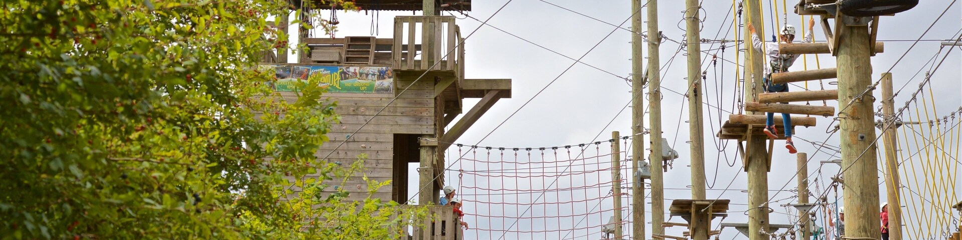 Creepy Valley Adventure Centre featuring a suspension bridge or treetop walkway