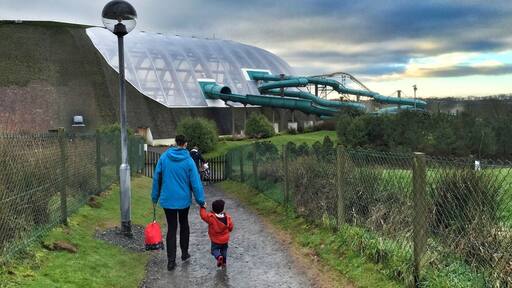 Walking to the Blue Lagoon! A small, but nice water park. Slides, wave machine, lazy river, kiddy area... and a bloody warm swimming pool. Ace!