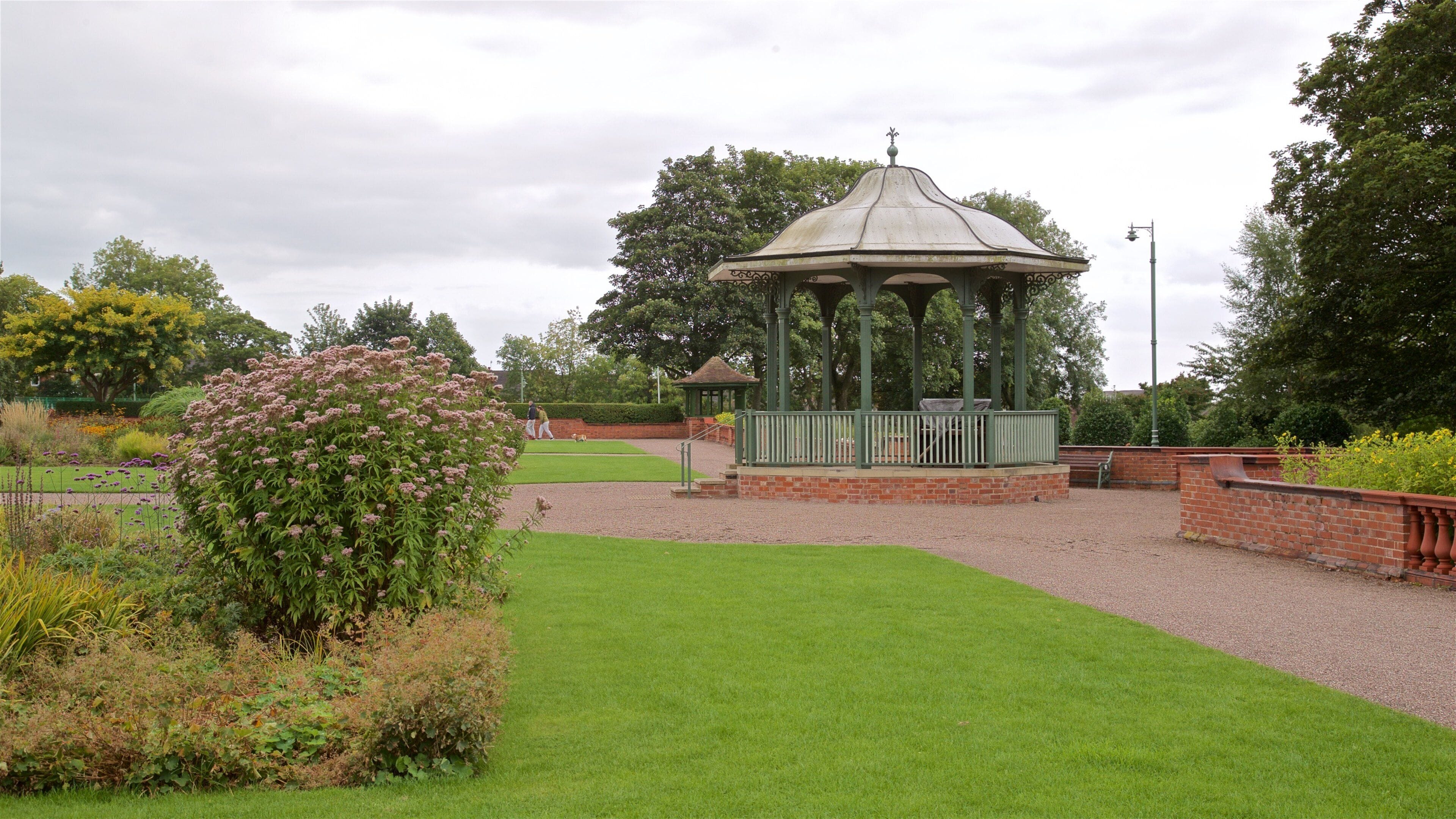 Burslem Park featuring wild flowers and a park