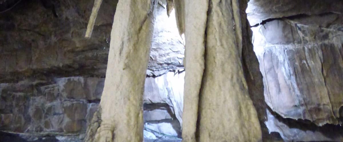 Stalactite formation inside Ingleborough Cave , just outside of Clapham in Yorkshire.  This is fondly known as 'The Elephant'. Can you see the resemblance? :) There's an interesting guided tour you can do through the cave and lots  more formations to see. . You can even take the dog!