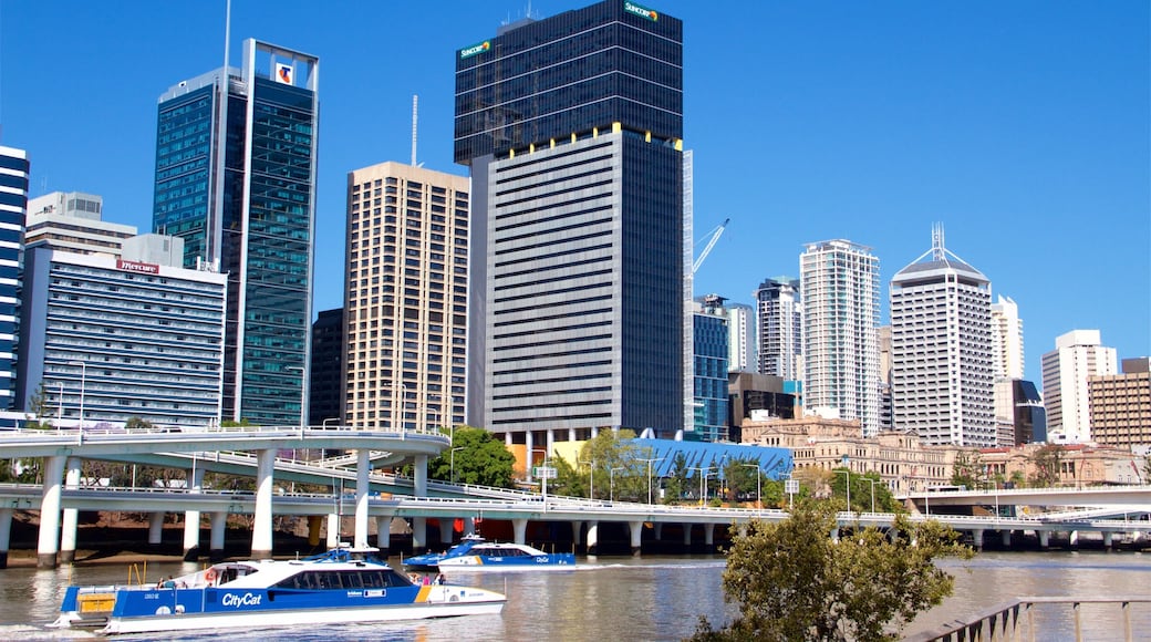 Southbank Parklands showing a city, a river or creek and a ferry