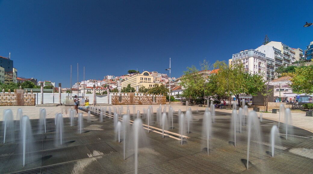 Fountain in Martim Moniz square timelapse hyperlapse in downtown Lisbon