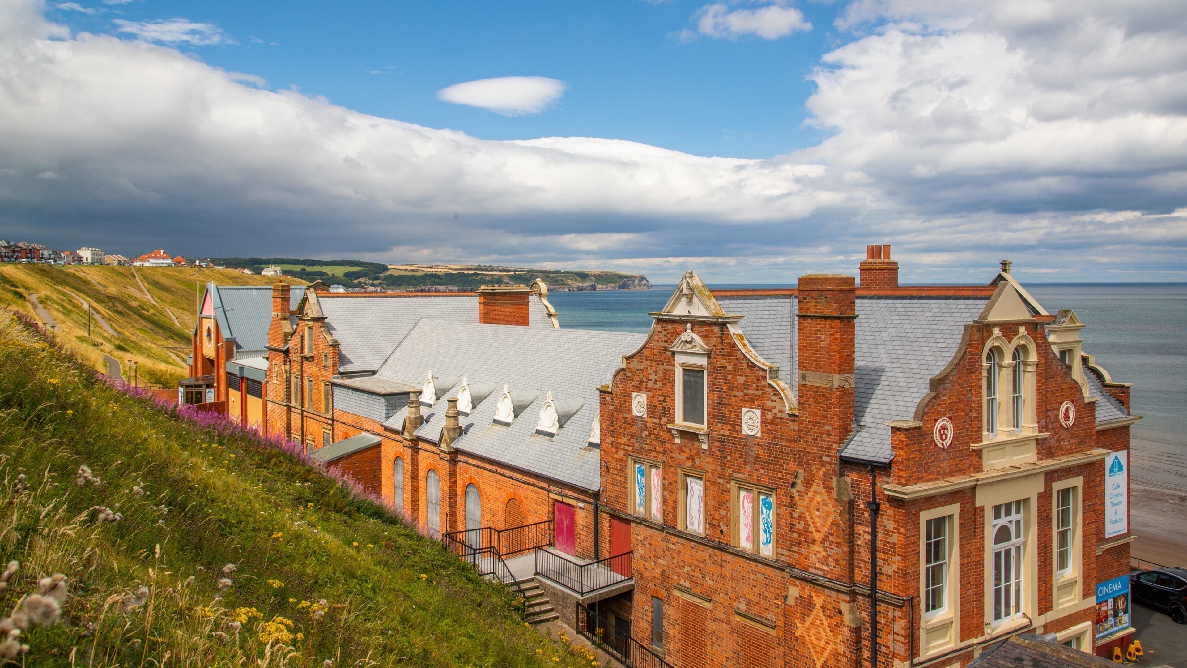 Whitby Pavilion which includes general coastal views and a coastal town