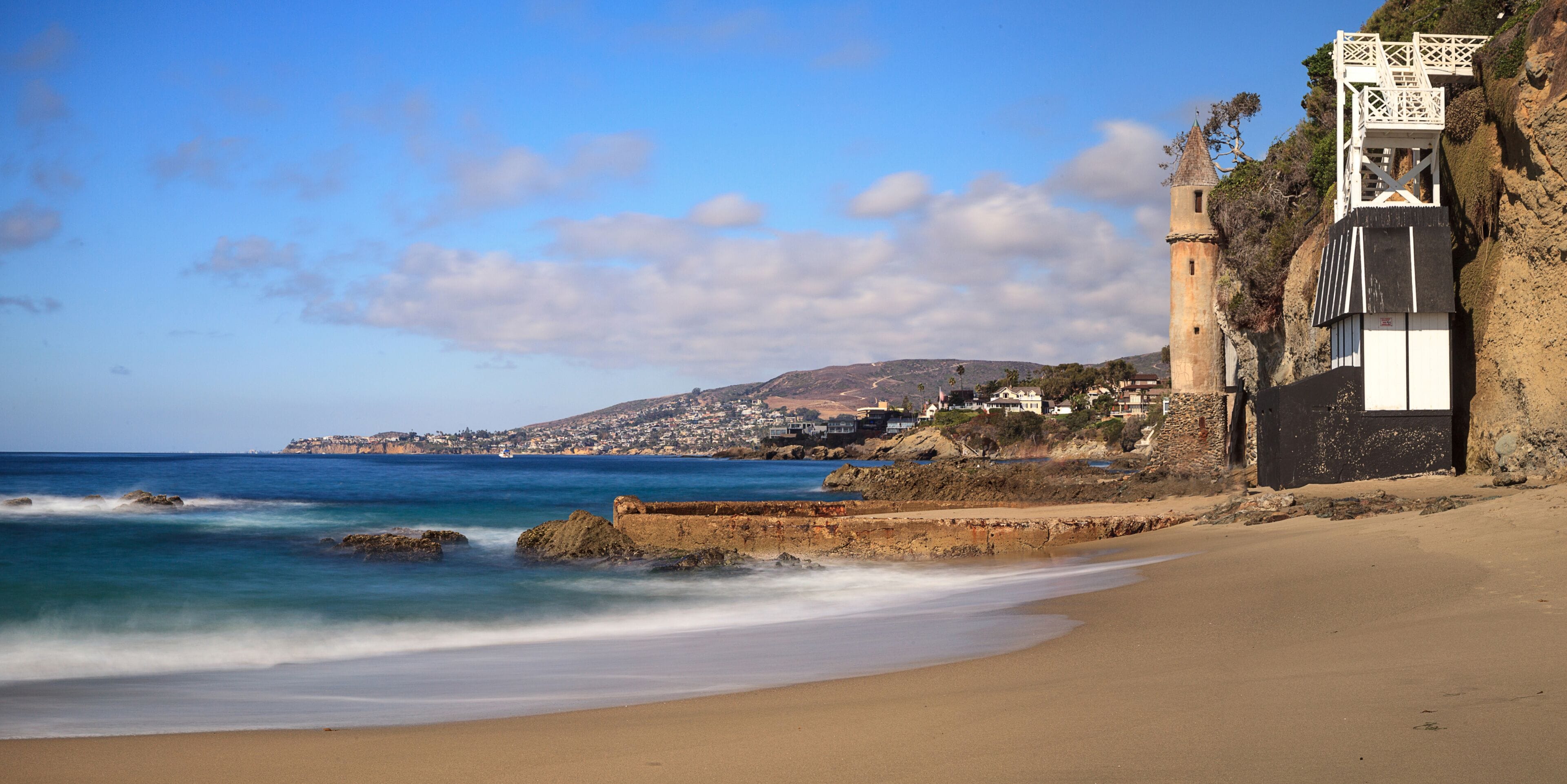 Tower over Rocky shores at Victoria Beach in Laguna Beach
