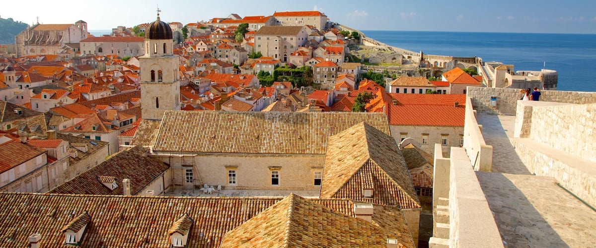 Walls of Dubrovnik featuring a coastal town and general coastal views