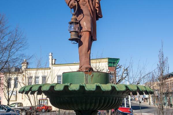 Middletown, NY - USA - Mar 13, 2021: View of th Fireman Joe Statue and Firefighters Memorial at Wallace Park, located at the corner of North Street and Depot Street.