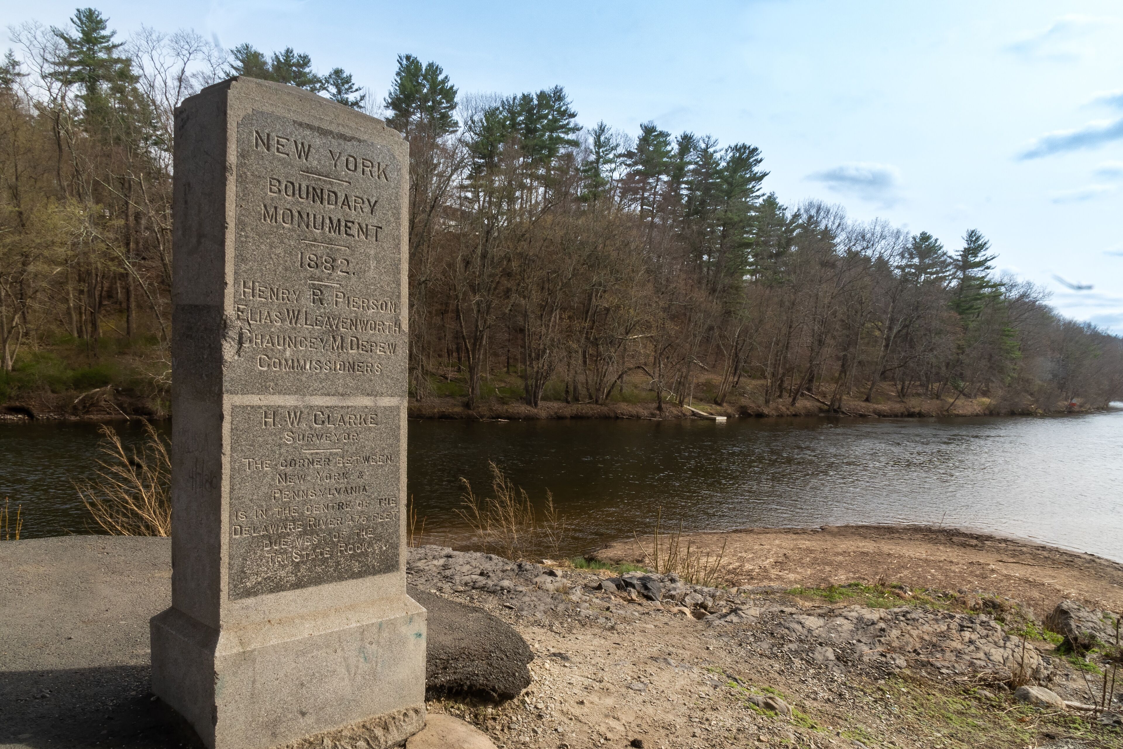 Port Jervis, NY - USA - April 10,2021: View of Witness Monument or the western State Line Monument, is a tall upright granite monument located south of the Laurel Grove Cemetery in Port Jervis, NY