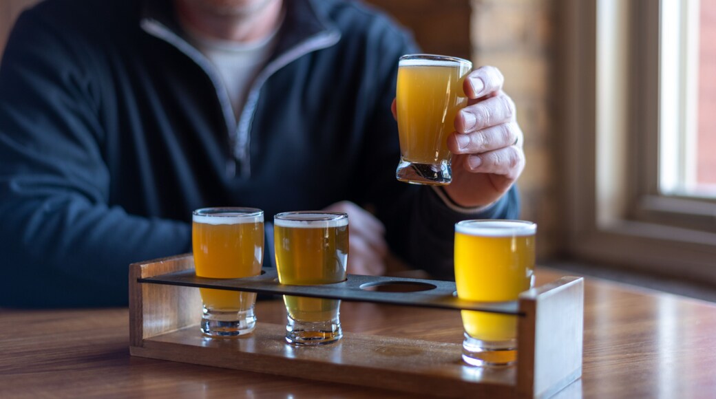 Man sampling craft beer at a restaurant