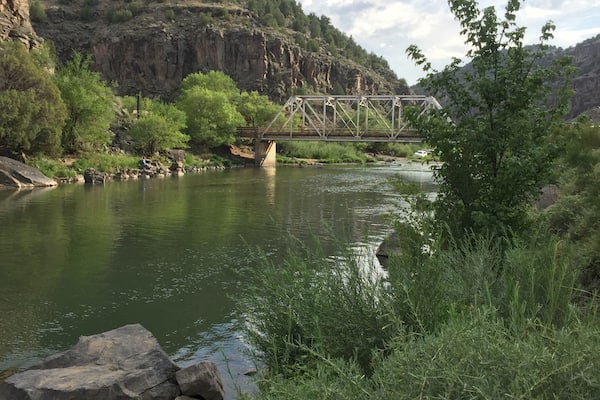 This swimming hole deep in the Rio Grande Gorge is both lovely and refreshing! Visitors spread out along the banks for a dip in the cool waters, and rock climbers ascend both sides of the canyon walls.