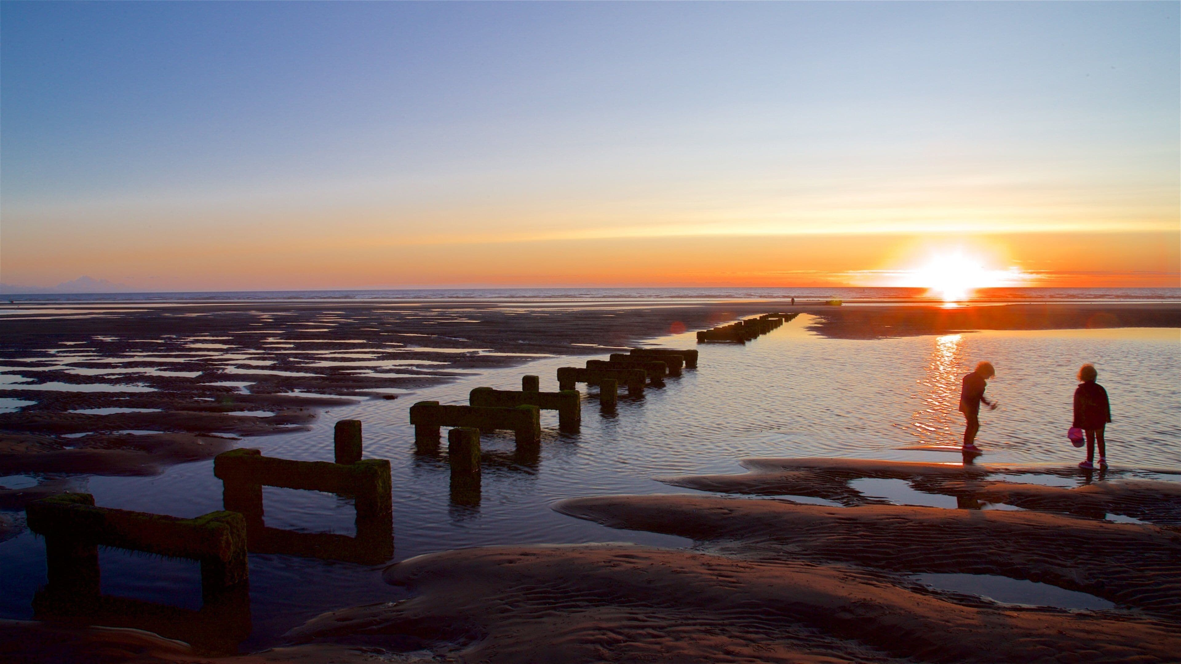 Central Beach which includes a sunset, general coastal views and landscape views