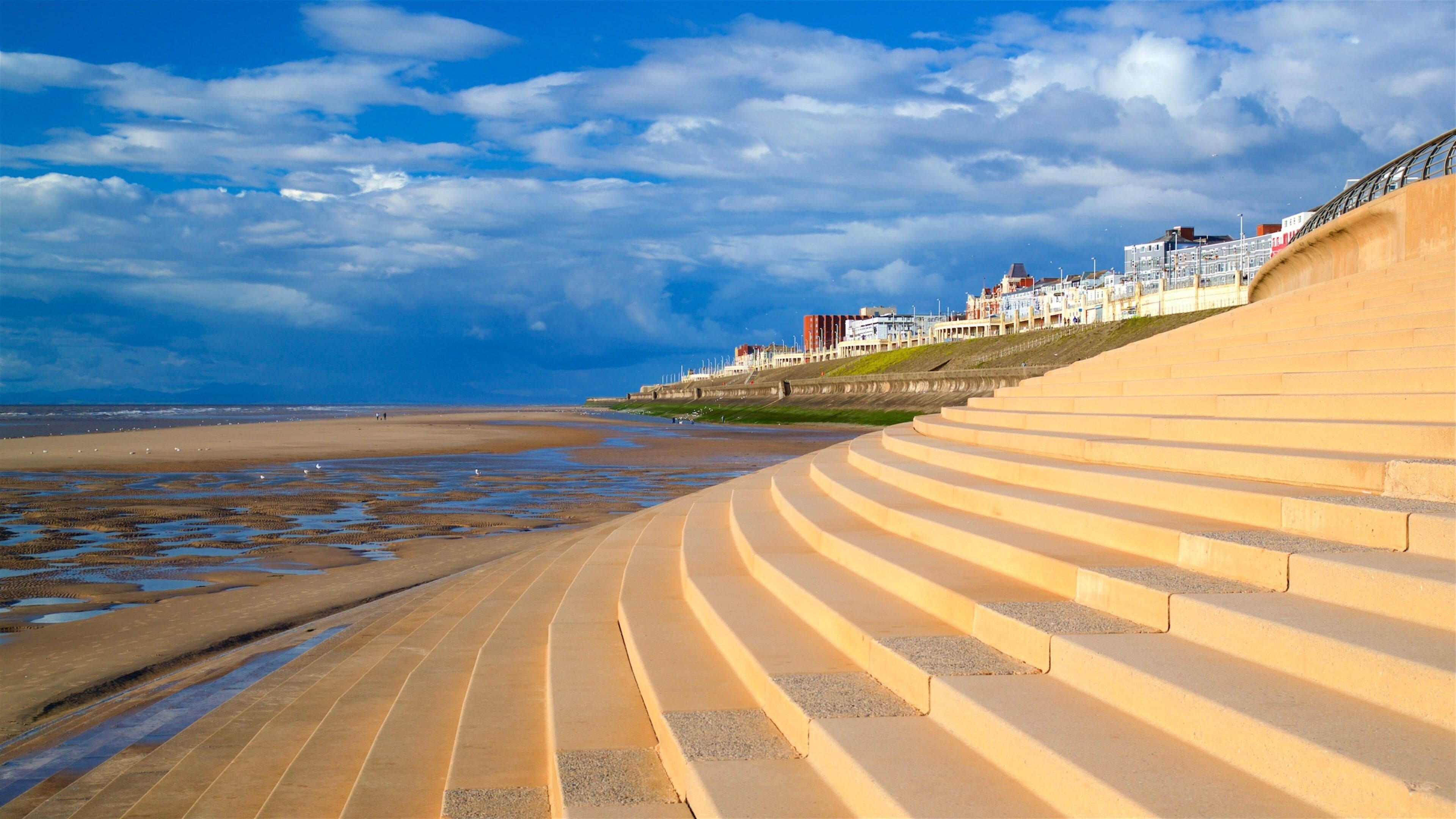 Blackpool North Shore Beach which includes a sandy beach, general coastal views and a coastal town