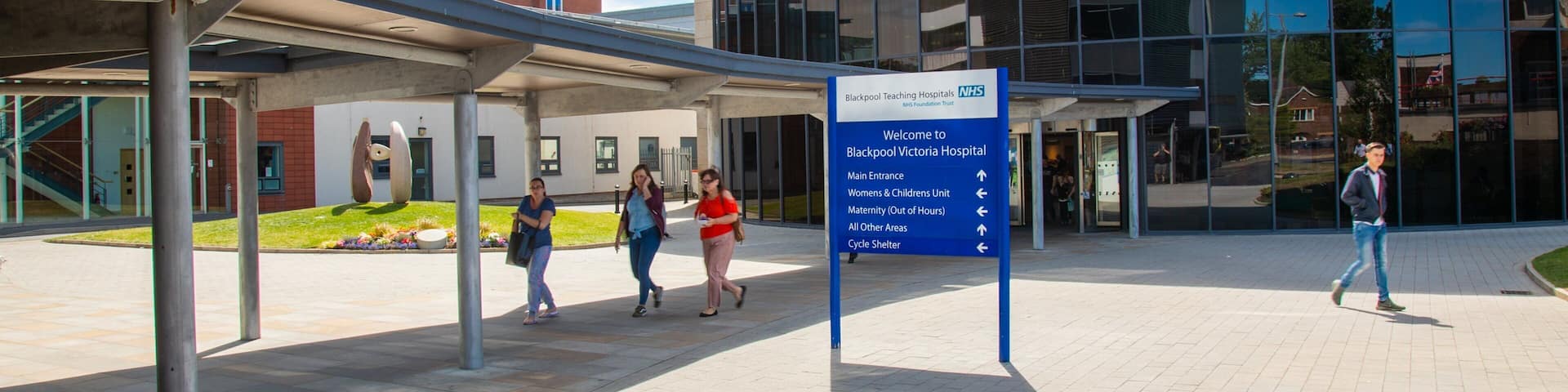 Victoria Hospital which includes signage and street scenes as well as a small group of people