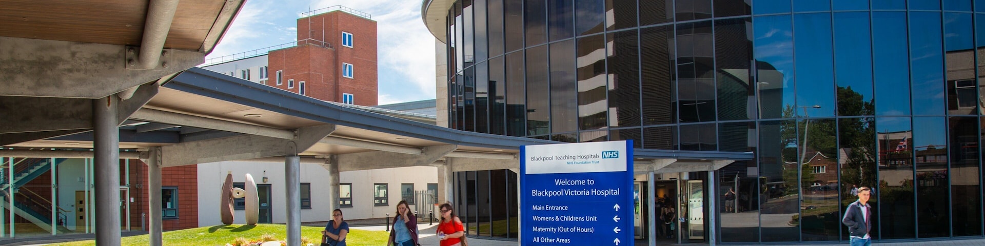 Victoria Hospital which includes signage and street scenes as well as a small group of people