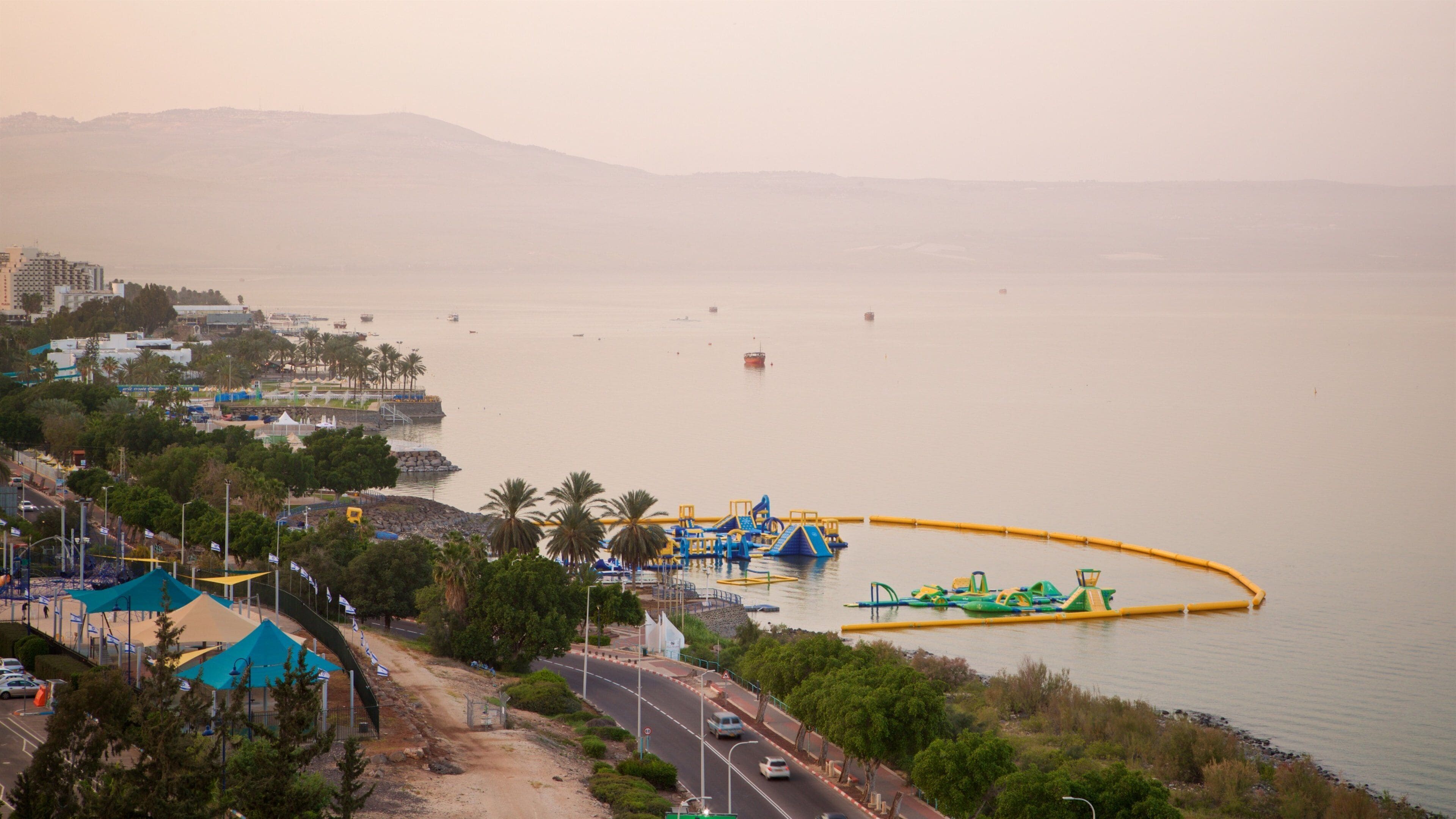 Sea of Galilee showing mist or fog and general coastal views