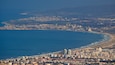 Mount Carmel which includes landscape views, a coastal town and general coastal views