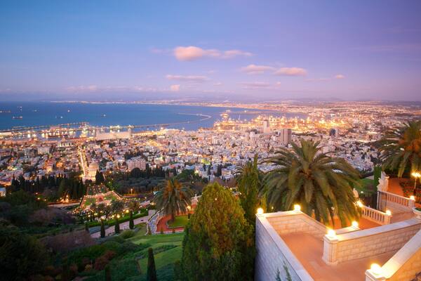 Haifa Port which includes a city, landscape views and a sunset