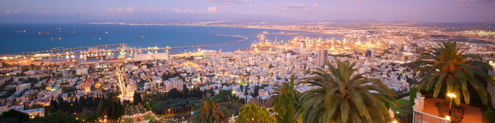 Haifa Port which includes a city, landscape views and a sunset