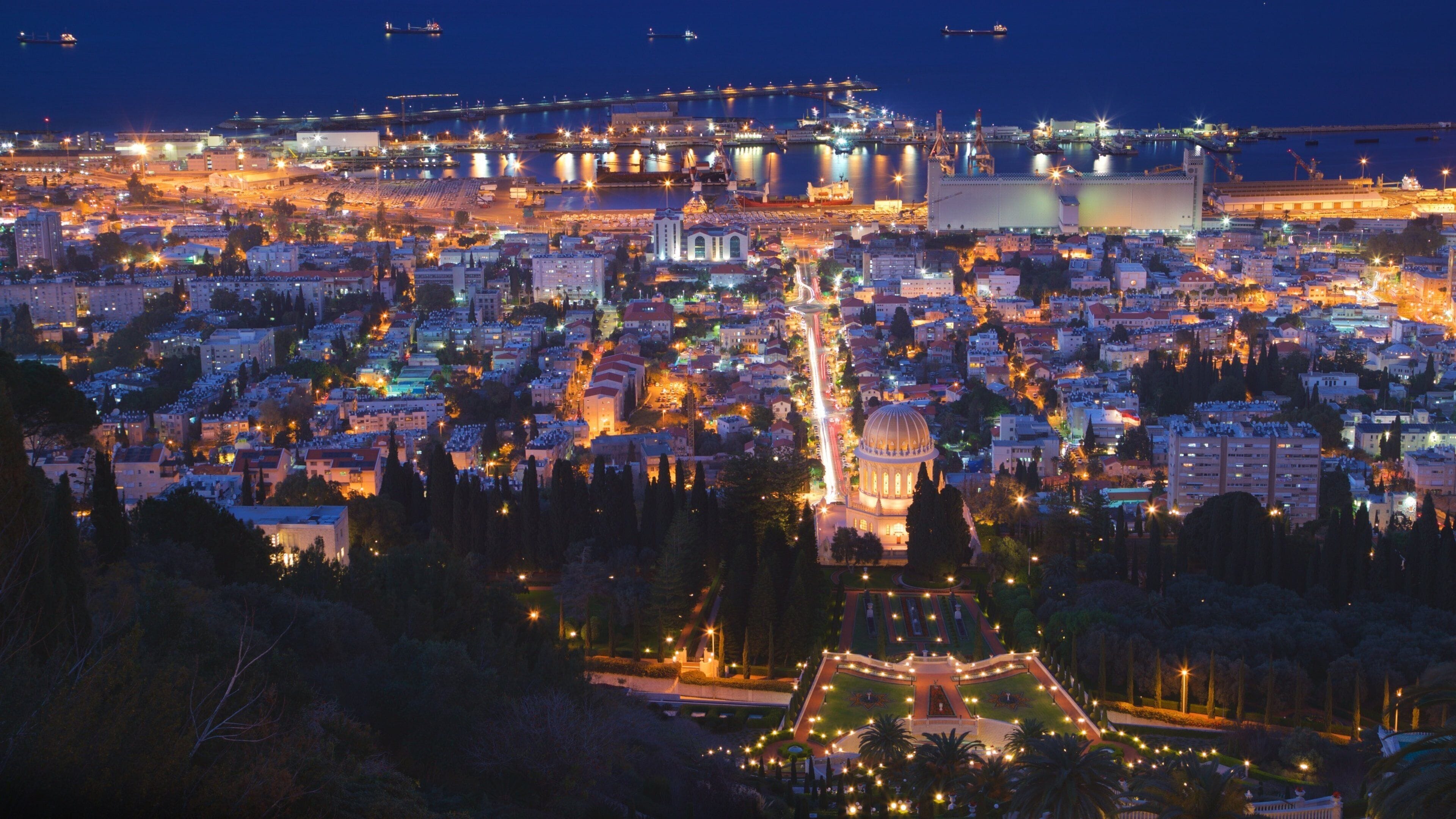Haifa Port showing night scenes, a city and landscape views