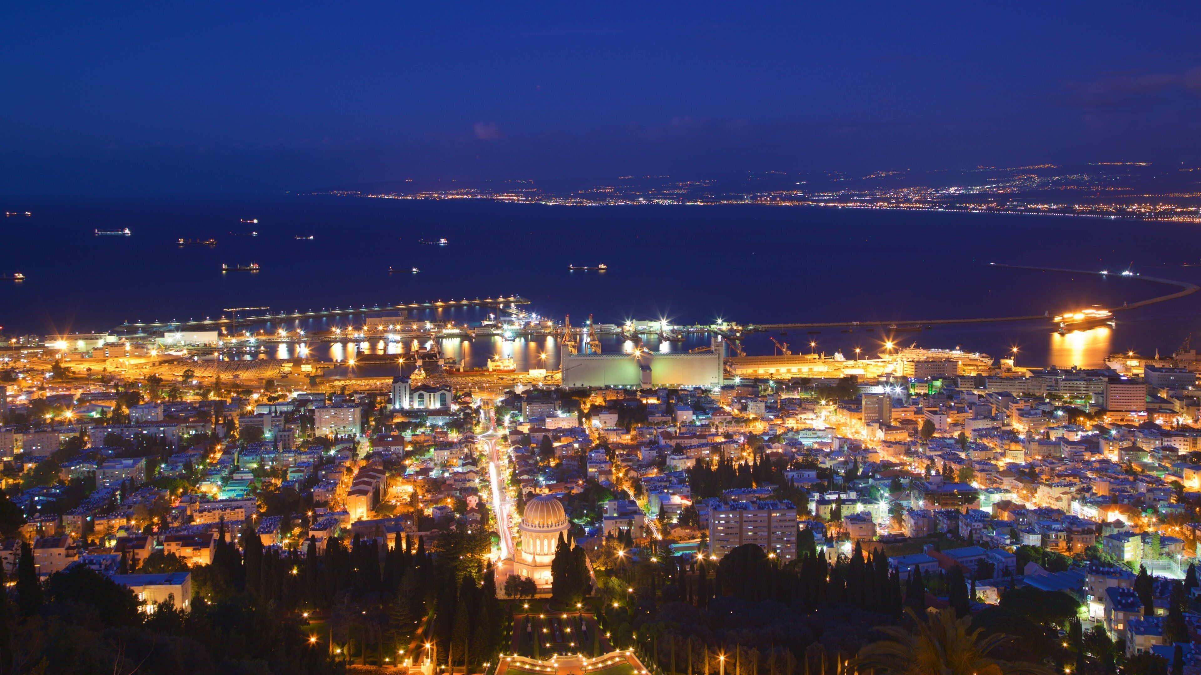 Haifa Port which includes a city, landscape views and night scenes