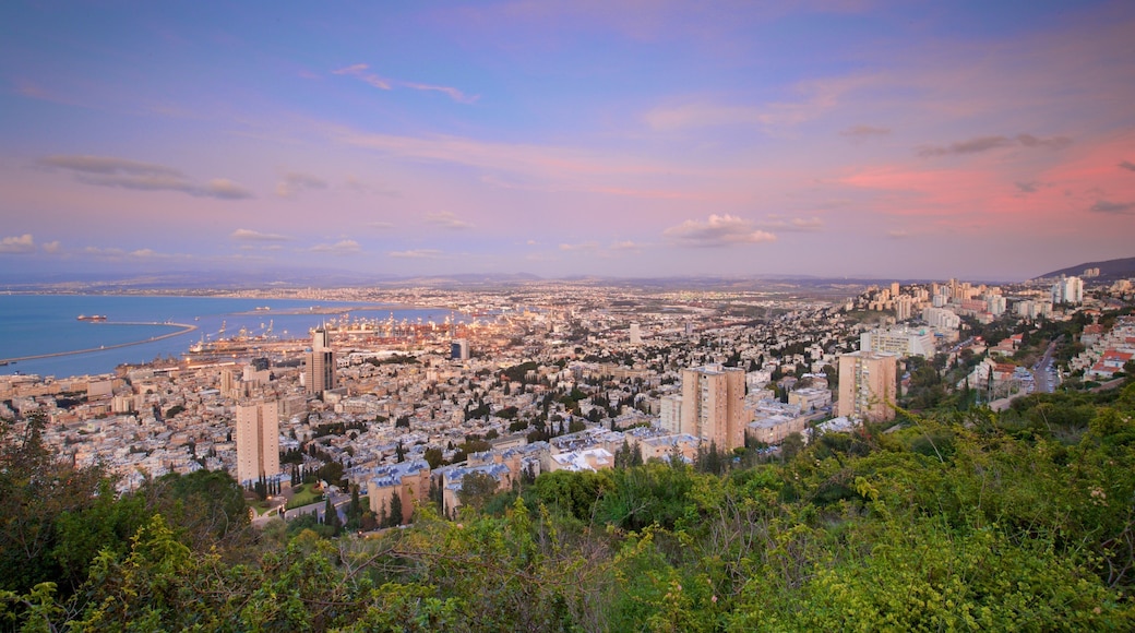 Haifa Port showing landscape views, a sunset and a city