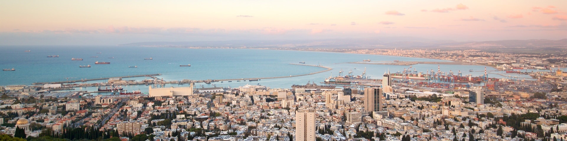 Haifa Port which includes a city, a sunset and landscape views