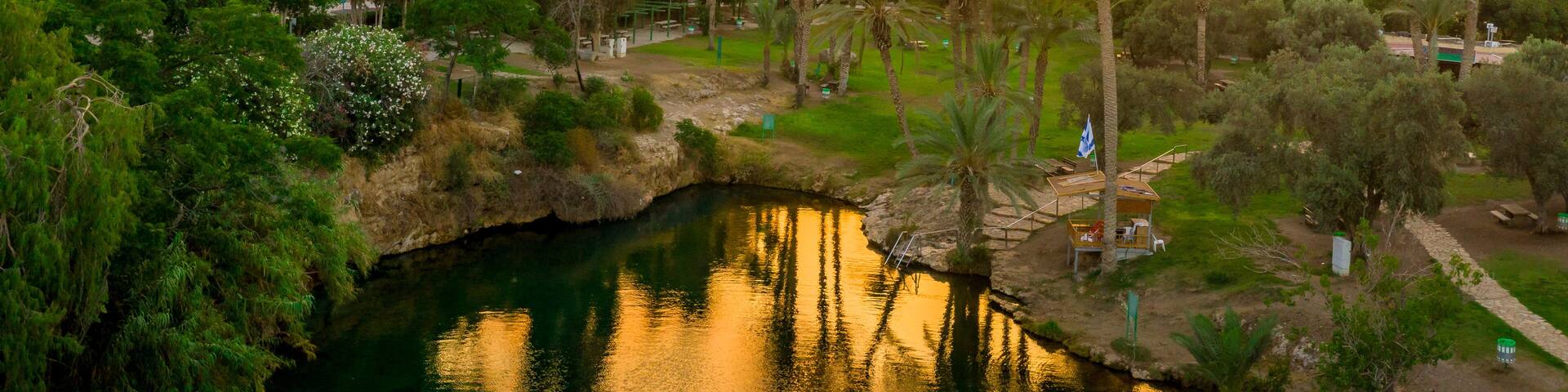 Aerial view of the sunset over Sachne or Gan Hashlosha oasis, with popular waterfall in Northern Israel