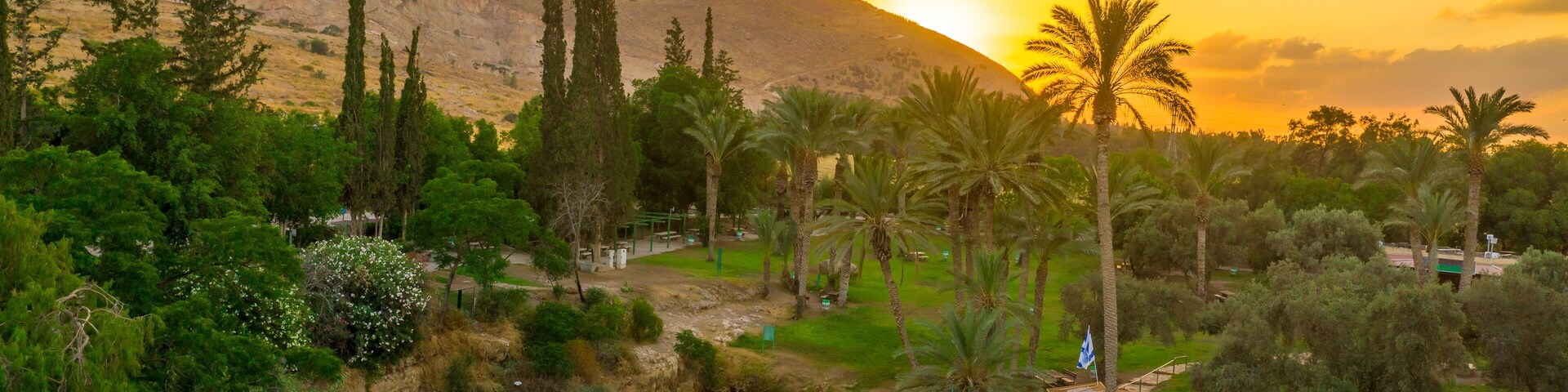 Aerial view of the sunset over Sachne or Gan Hashlosha oasis, with popular waterfall in Northern Israel