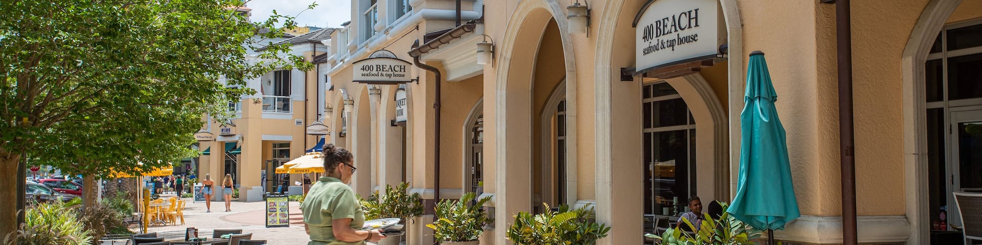 400 Beach featuring street scenes as well as an individual femail