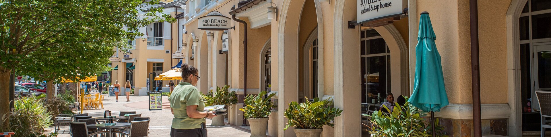 400 Beach featuring street scenes as well as an individual femail