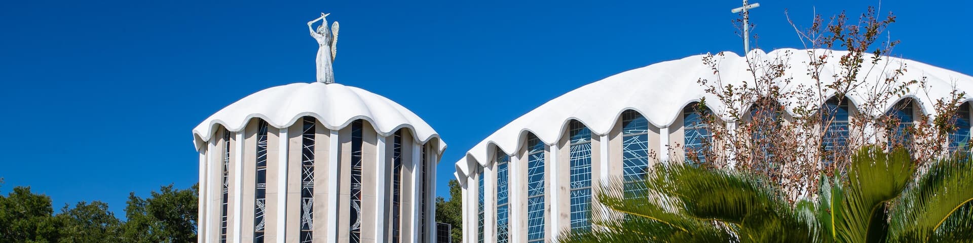 St. Michael Parish Catholic Church featuring a church or cathedral and a garden