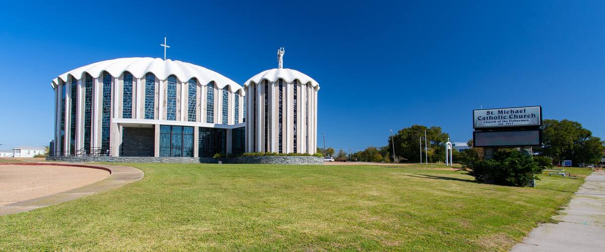 St. Michael Parish Catholic Church showing signage and a church or cathedral