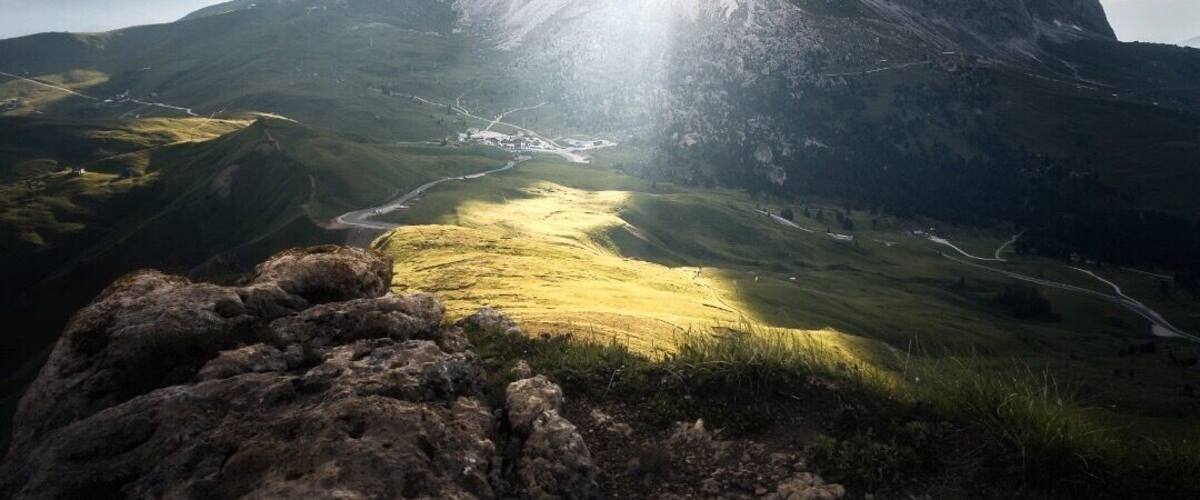 We hiked up a hill at Sella Pass in the Dolomites and was greeted by this amazing display of light just as the sun was about to disappear behind the mountains.