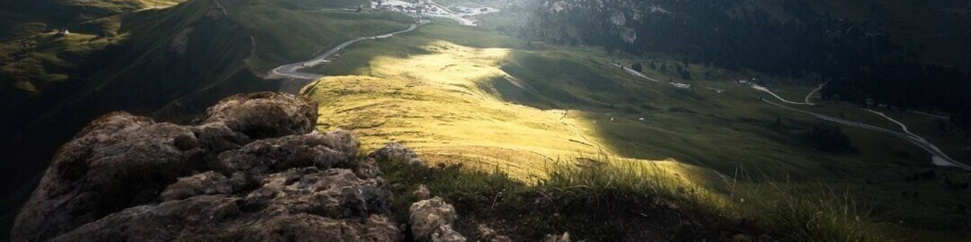 We hiked up a hill at Sella Pass in the Dolomites and was greeted by this amazing display of light just as the sun was about to disappear behind the mountains.