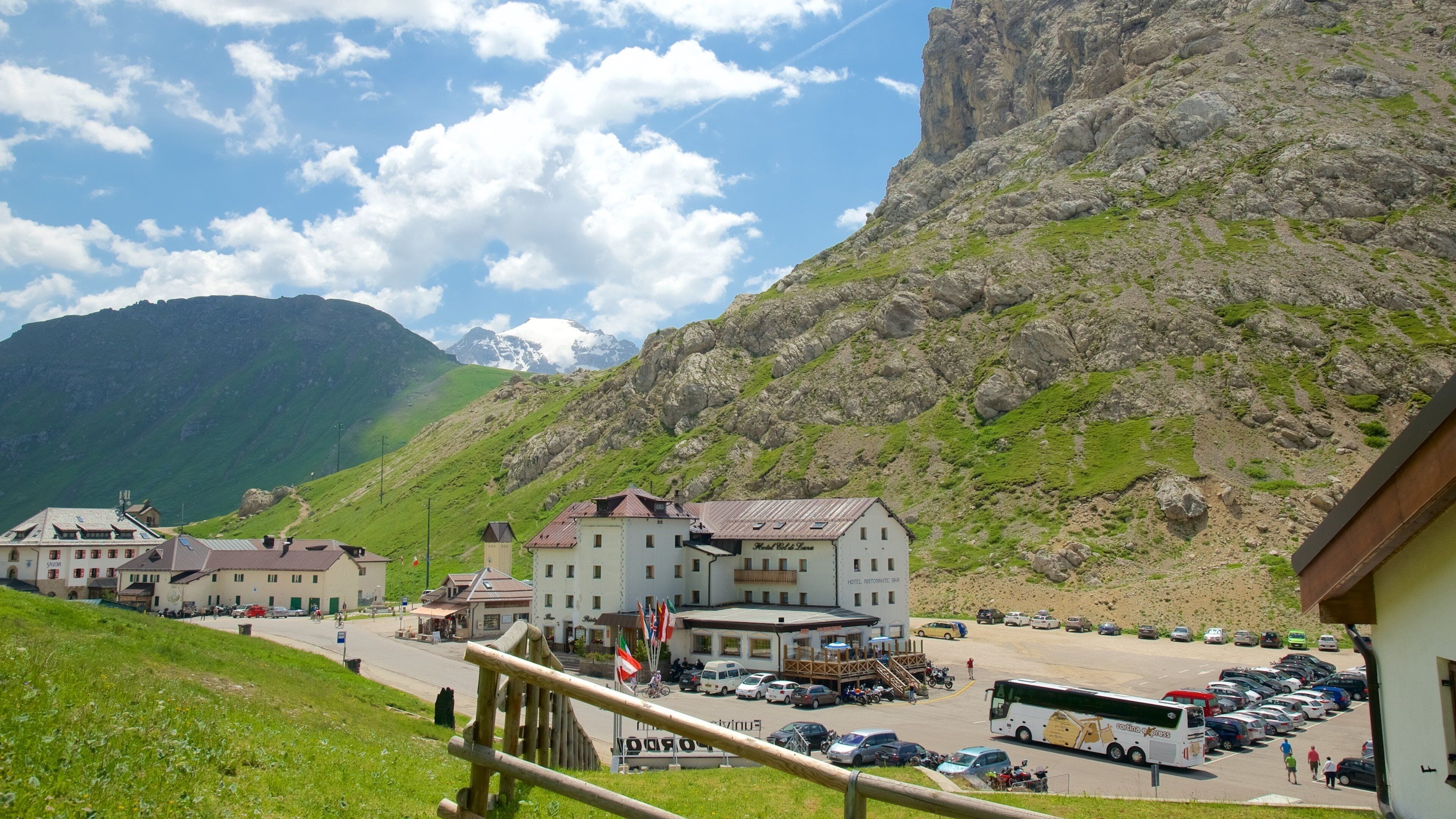 Trentino which includes a small town or village and mountains