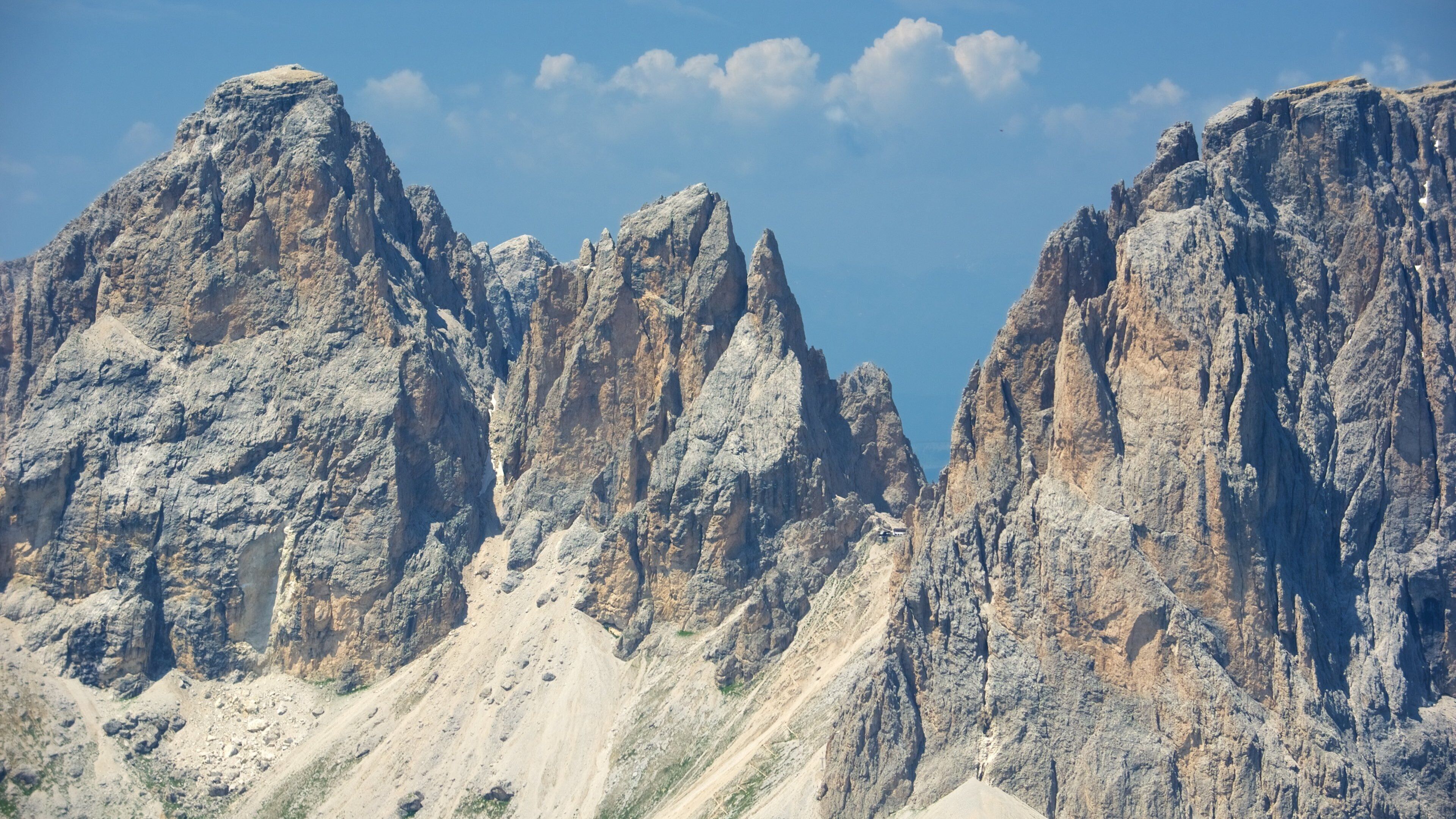 Rugged mountain peaks under a clear sky.