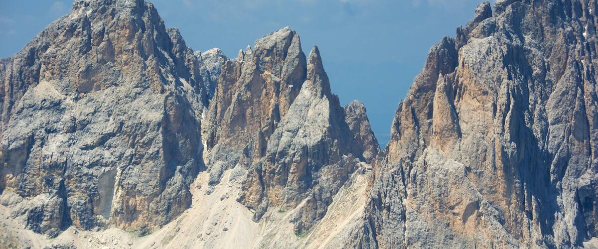 Rugged mountain peaks under a clear sky.