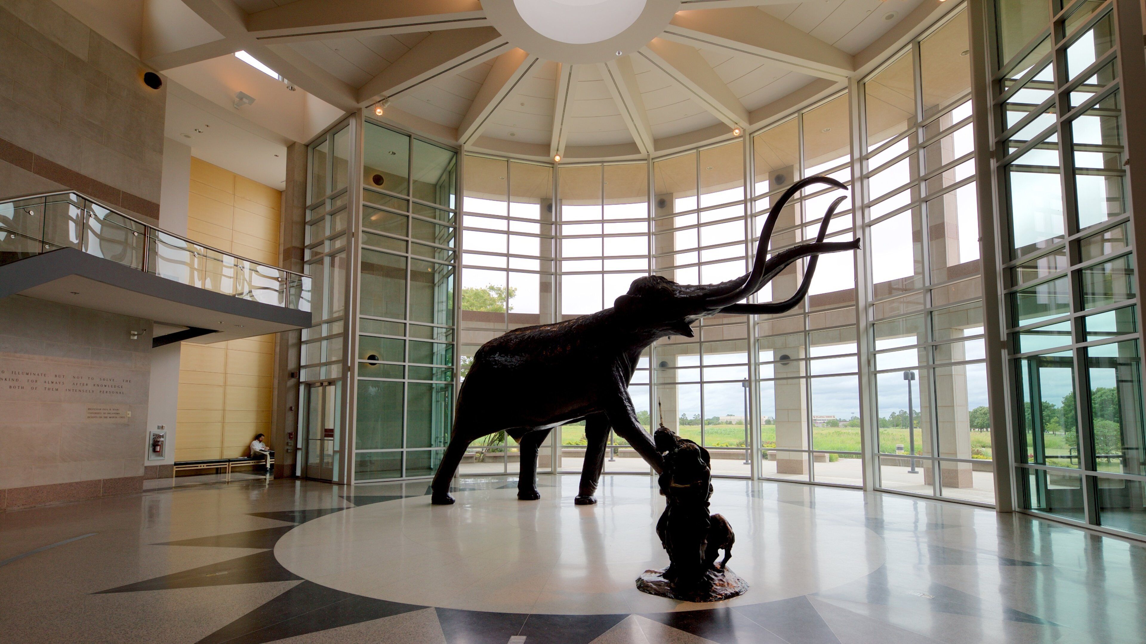 Sam Noble Oklahoma Museum of Natural History which includes a statue or sculpture and interior views