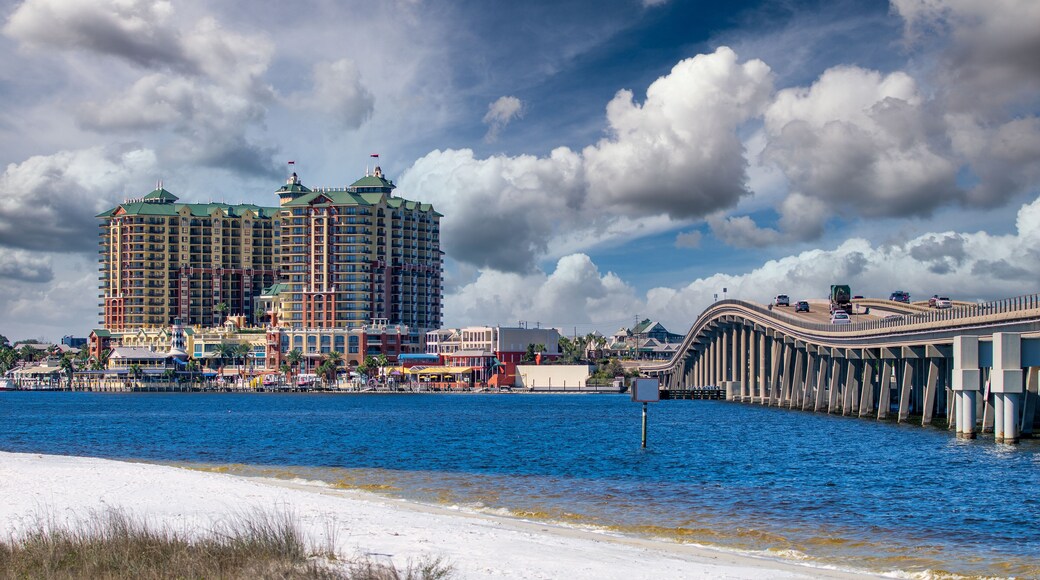 Bridge to Destin and city hotels under a sunset winter sky, Florida.