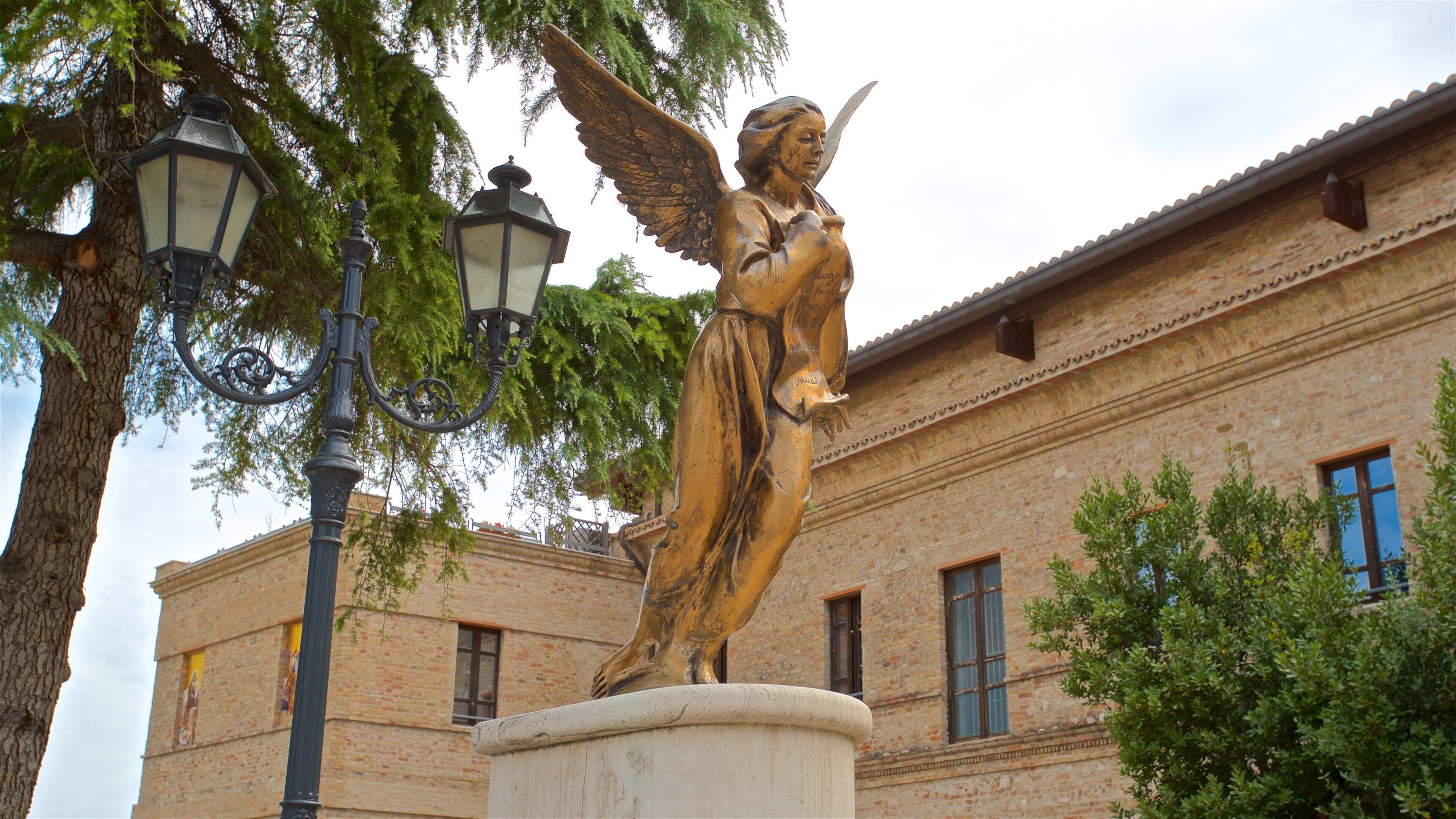 Santuario della Madonna dello Splendore which includes a statue or sculpture and religious elements