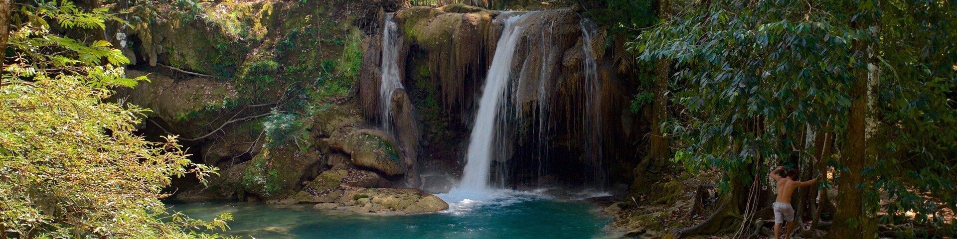 Cascada de Roberto Barrios which includes a river or creek and a waterfall as well as a couple