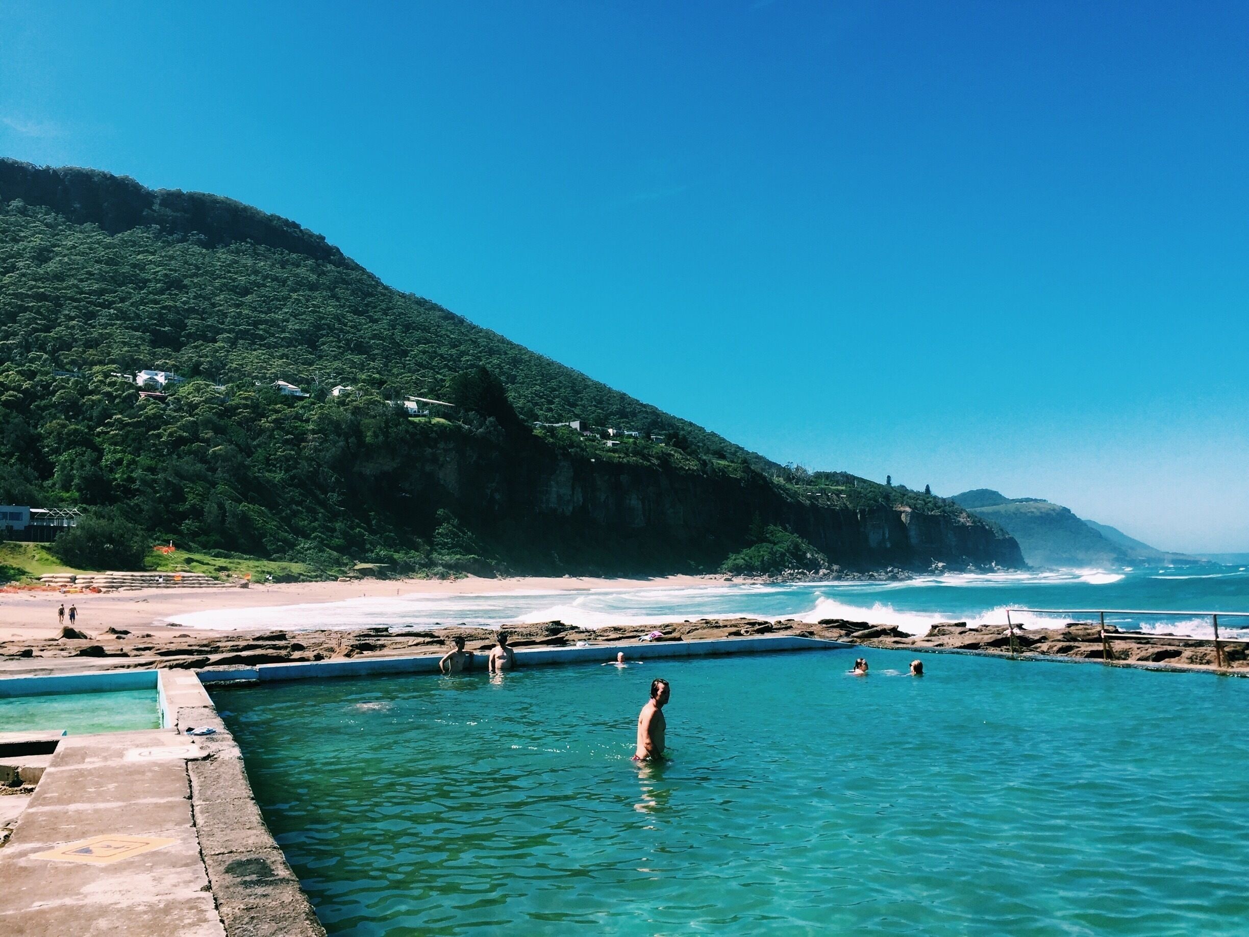 Take a turn just off Sea Cliff Bridge and experience the awe of one of New South Whales' hidden beaches. I think this beach perfectly showcases the uniqueness of Australia's beaches, with greenery, an ocean pool and sand all in one spot. And how blue is that water! For the adventurous, go hang gliding, or drive Sea cliff bridge for spectacular #beachbound views ! #australia #adventure #roadtrip