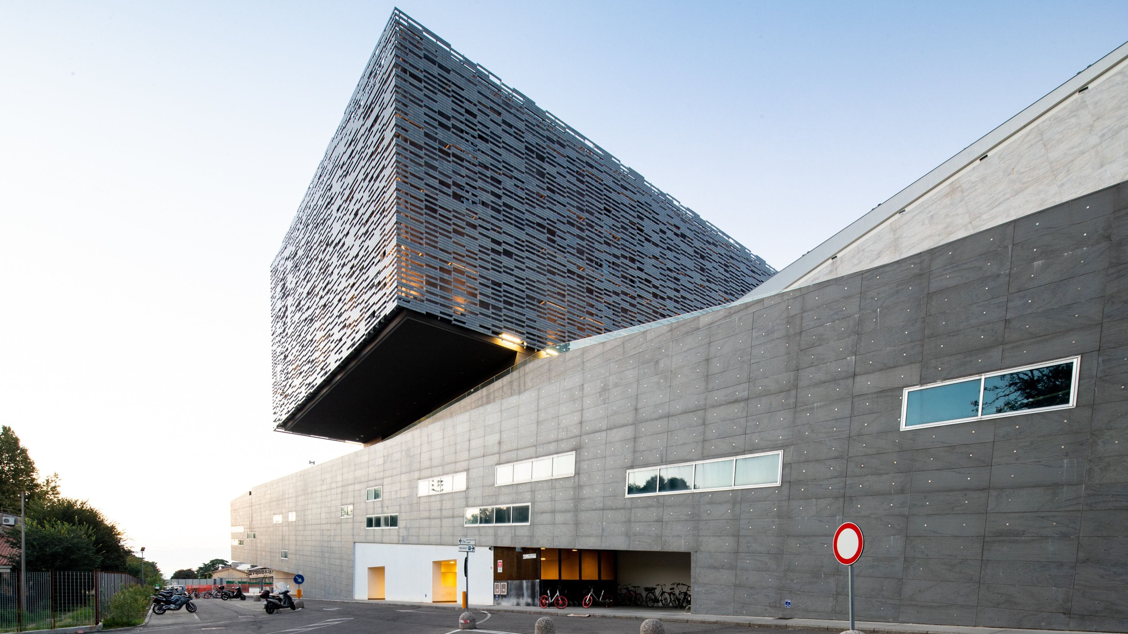 Arcetri showing modern architecture and a sunset