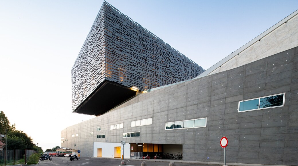 Arcetri showing modern architecture and a sunset