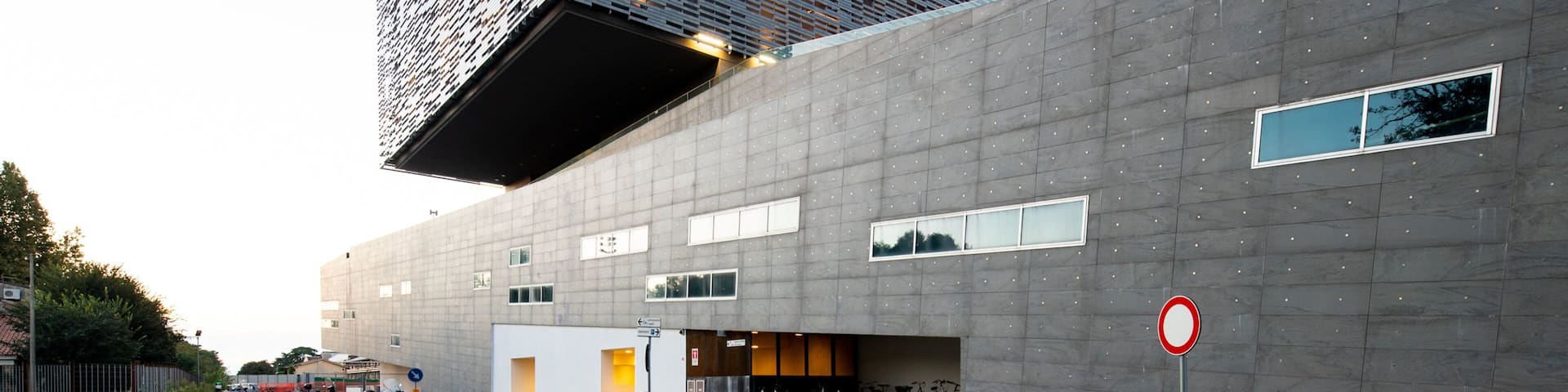 Arcetri showing modern architecture and a sunset