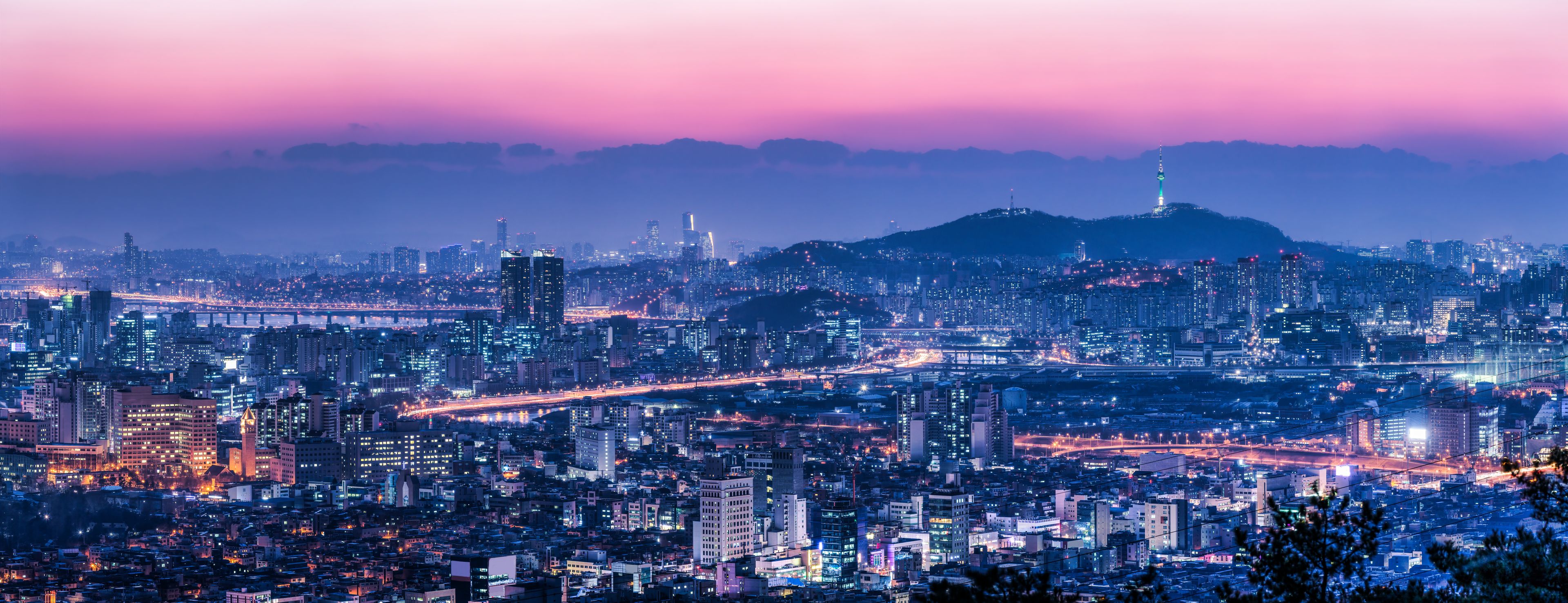 Seoul skyline at night with view of Namsan mountain and N Seoul Tower