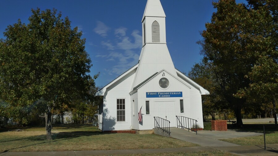 Façade of the First Presbytherian Church in Caddo, Oklahoma seen from the roadside