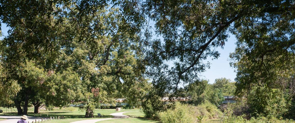 Stephenville Texas Park Trail where handicapped person rides a scooter