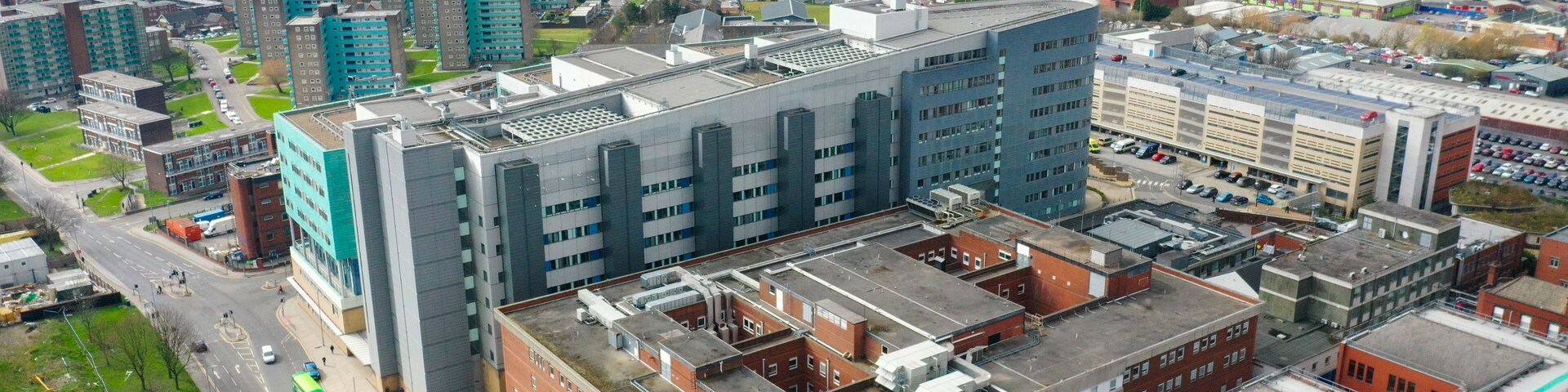 Aerial photo take in the town of Harehills in Leeds just outside the city centre, showing the St James's University Hospital known as Jimmy's with traffic and ambulances parked up at A and E entrance