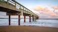 St. Augustine Beach featuring a beach, general coastal views and a sunset